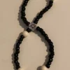 Tradera Fotlänkar<blomma pärlor svart fotlänk eller armband