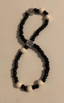 Tradera Fotlänkar<blomma pärlor svart fotlänk eller armband
