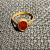 Tradera En gammal ring med röd sten från tidigt 1900-tal.> Övrig Antik & Design