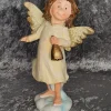 Tradera Samlarfigurer<Flicka med vingar / Ängel, med en klocka i handen