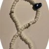 Tradera Fotlänkar<fotlänk 24 cm små vita glaspärlor elastisk unik