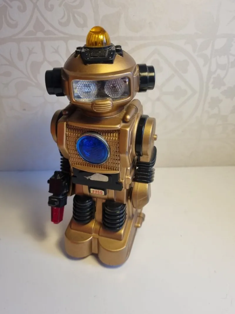 Tradera Gul robotleksak med ljus och ljud> Robotleksaker & Robotdjur