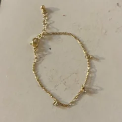 Tradera Armband<Guldigt armband