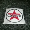 Tradera ÄLDRE TYGMÄRKE CALTEX^ Bensinia