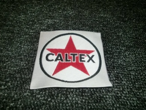 Tradera ÄLDRE TYGMÄRKE CALTEX^ Bensinia