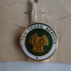 Tradera Mobilia<MORGAN emblem pin Ten Years Service 15 mm metall