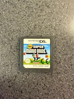 Tradera Nintendo<New Super Mario Bros. (Nintendo DS)