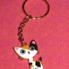 Tradera Nyckelring med katt av emalj/zinklegering/rostfritt stål.^ Accessoarer