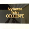 Tradera Nyheter från Orient.Hårdplast. Svart och guld. Skyltställ från -70talet.46x28^ Övrigt Klockrelaterat