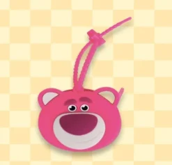 Tradera Oanvänd nyckelring/väsksmycke/portmonä/myntbörs I silikoner med disney lotso> Övriga Accessoarer