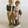 Tradera Royal Copenhagen Overglasur figur af Flugten til America No 1761> Bruks- & Prydnadsföremål