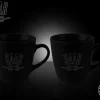 Tradera 2st svarta kaffemuggar SAAB. Nya!^ Veteranbilar Före 1990