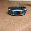 Tradera Tentråds Armband- Sameflagans färger gjort med pärlor - 18 cm- 2 cm bred> Hemslöjd