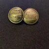 Tradera Järn- & Spårvägsmemorabilia<Två antika knappar med lokmotiv