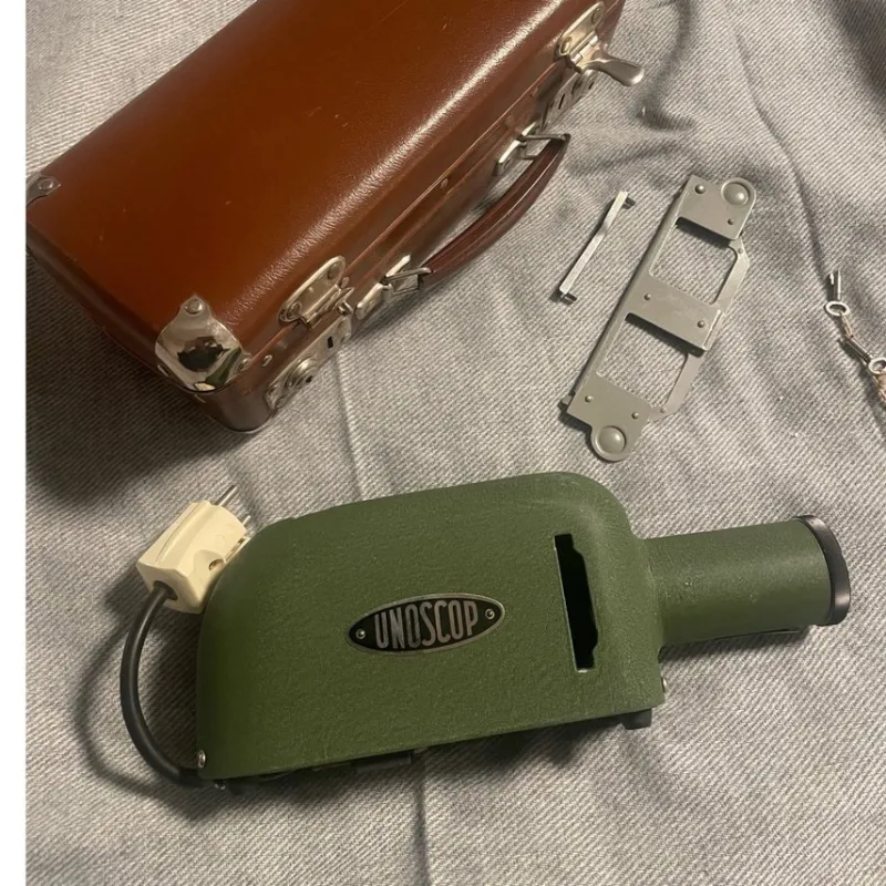 Tradera UNOSCOPE Diaprojektor^ Analoga Projektorer