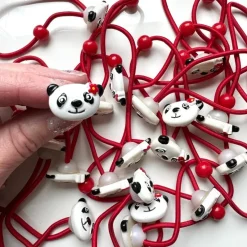 Tradera Varupartier<VARUPARTI 35 st - Hårsnoddar i röd färg med gullig panda från Lollipop