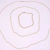 Tradera Smyckespaket<Vintage pearl necklaces-2 cultured pearl necklaces and a plastic pearl necklace