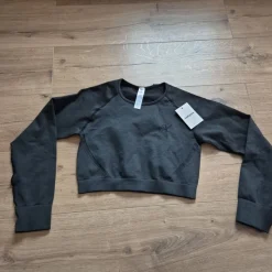 Tradera Xshapes svart topp, storlek L^ Damkläder