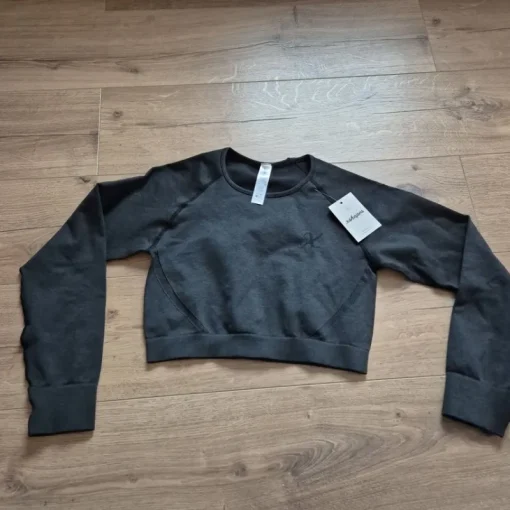 Tradera Xshapes svart topp, storlek L^ Damkläder